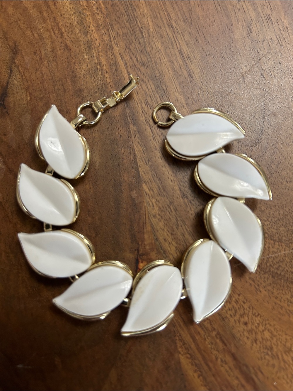 White Leaf Link Bracelet in Gold Tone